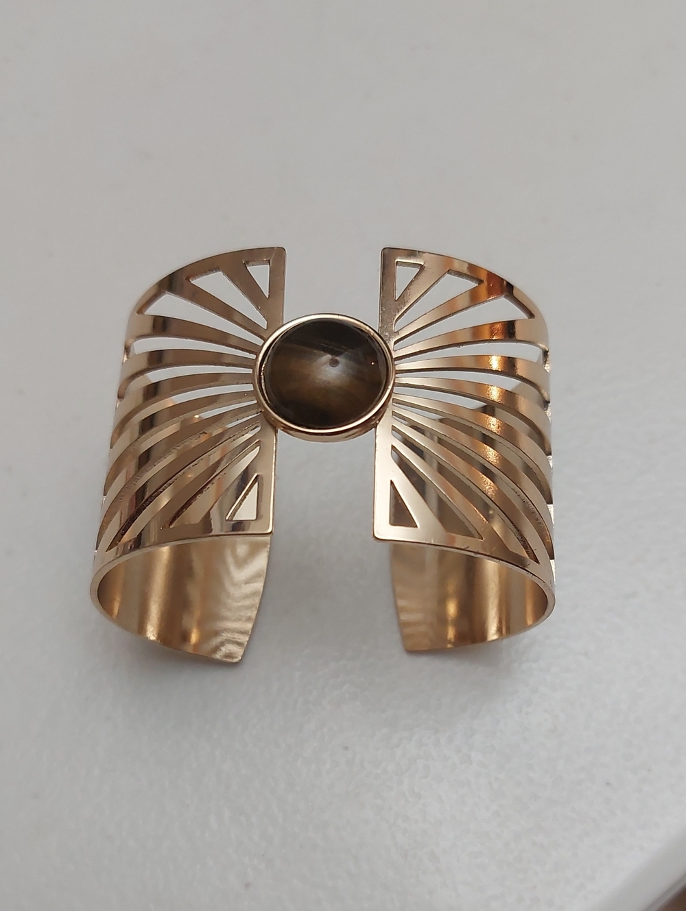 Gold Tone Metal Sunburst Cutout Cuff Bracelet with Brown Faux Tiger’s Eye Stone